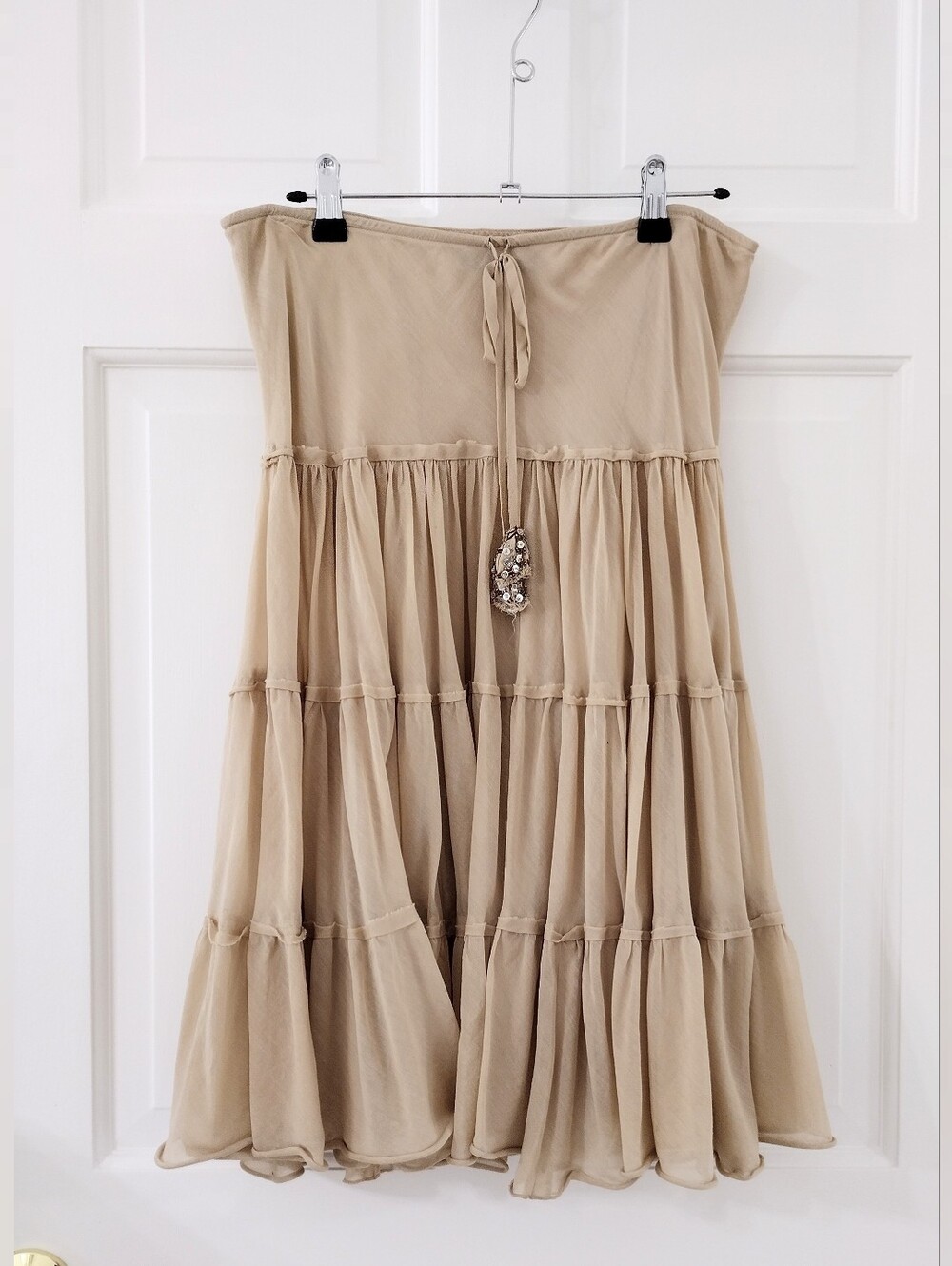 Y2K Express Tiered Strapless Maxi Skirt in Beige with Tassel